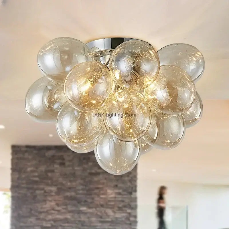 Modern amber glass chandelier led cluster ceiling lamp with translucent amber globes and chrome base for bedroom