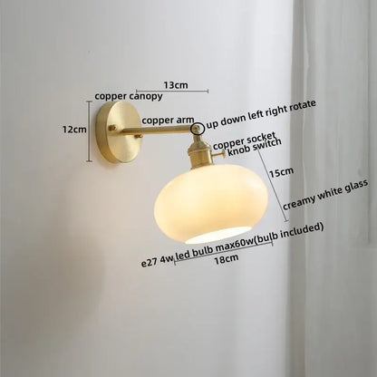 Modern amber glass copper led wall lamp with creamy white glass shade designed as a copper led wall sconce