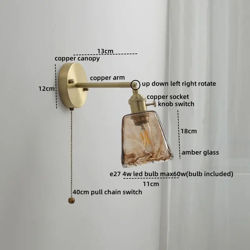 Modern amber glass copper led wall lamp featuring a vintage brass-finished copper arm and visible led bulb sconce