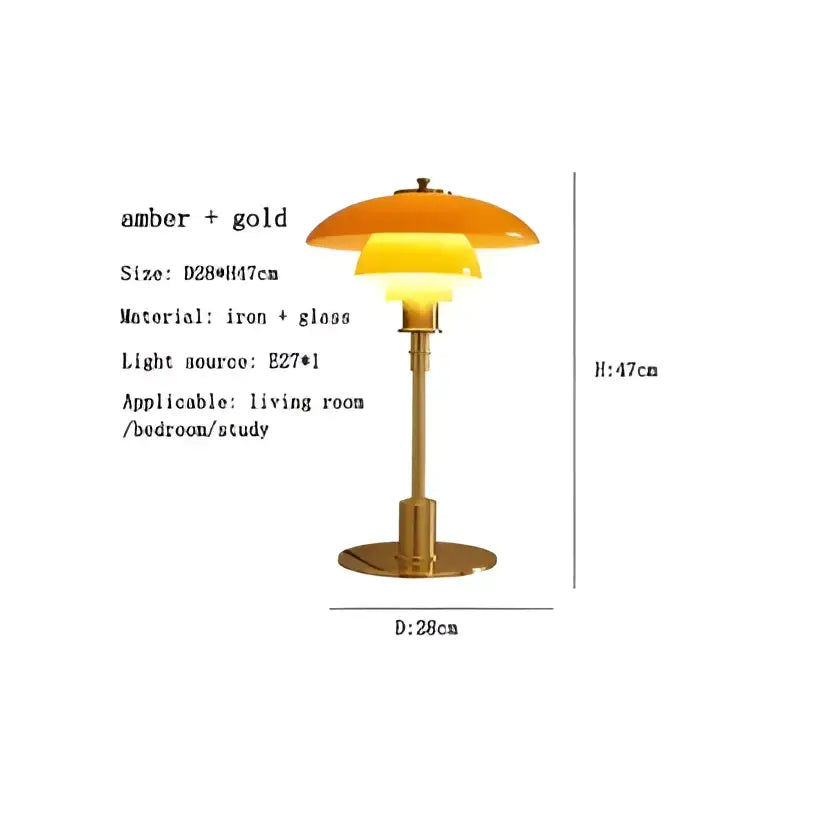 Modern amber glass desk lamp with tiered glass shades and golden brass finish on sleek iron base for decorbites glass desk