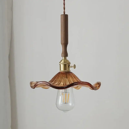 Modern amber glass led pendant light with warm amber glass, wooden handle, and brass hardware for dining room decorbites amber glass