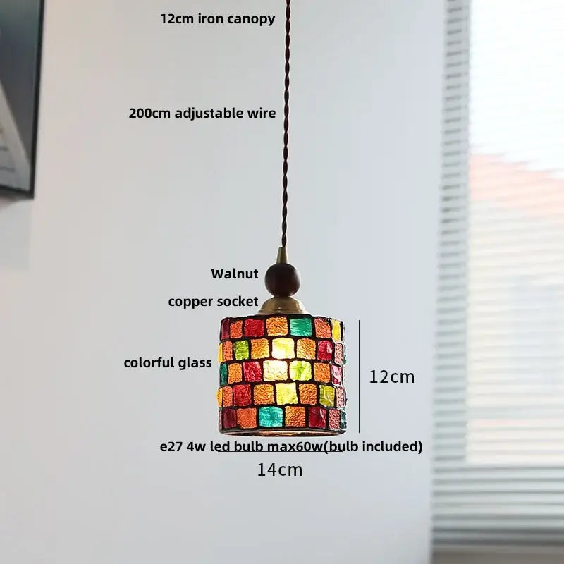 A vibrant 12cm amber glass led pendant light with colorful mosaic panels and walnut-finished copper socket for dining room