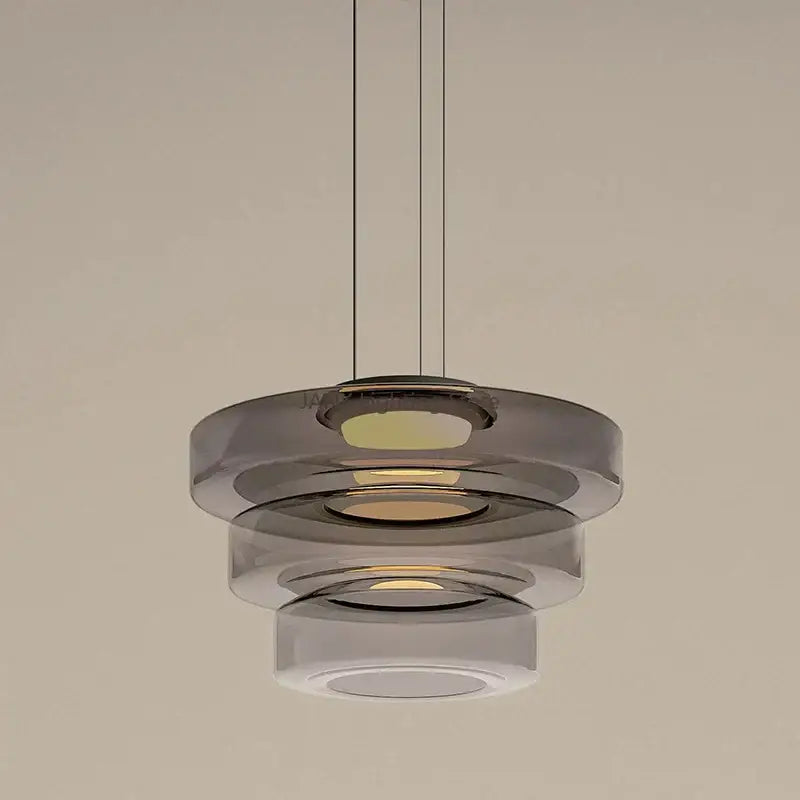 Modern amber glass chandelier led pendant with tiered smoked glass rings and warm led illumination for dining room