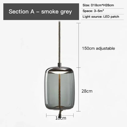 Smoke grey cylindrical glass pendant light with a metallic finish and led patch light source for modern decorbites brokis knot glass