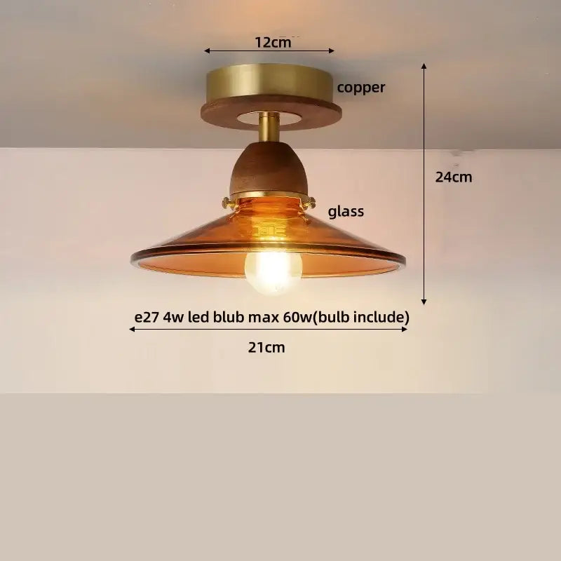 Copper-finished ceiling light with decorbites amber glass shade and warm glowing led bulb for living room decor