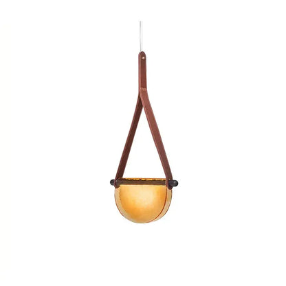 Modern amber and gray handmade leather glass pendant lamp with warm amber glass bowl and brown leather straps for decorbites