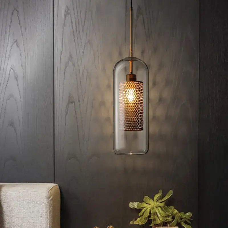 Modern amber honeycomb decorbites glass ball pendant light with clear glass enclosure and brass-toned fixture for kitchen