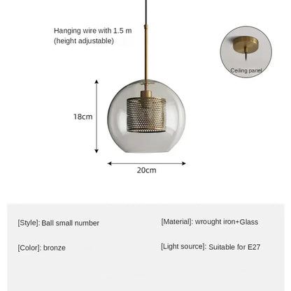 Modern amber honeycomb decorbites glass ball pendant light with bronze perforated metal cage and clear glass globe for kitchen