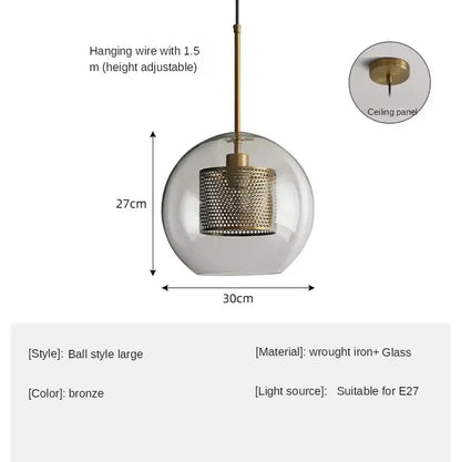 Bronze pendant light with clear glass ball led and perforated wrought iron shade for modern kitchen decorbites design
