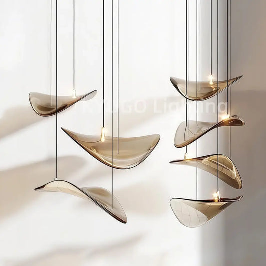 Modern amber lotus leaf glass pendant light with sleek curved design and amber light color options for dining room use