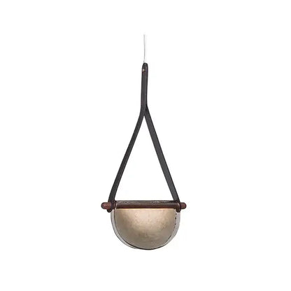 A sleek half-moon matte gold metallic hanging planter with dark brown leather straps for decorbites handmade glass pendant lamp decor