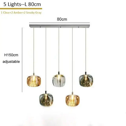 Modern amber and smoke crystal staircase chandelier with five glass globe bulbs on a sleek silver metal bar