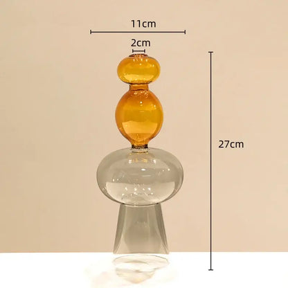 A translucent amber glass vase with stacked spheres and a flared base for modern double glazing stained glass decor