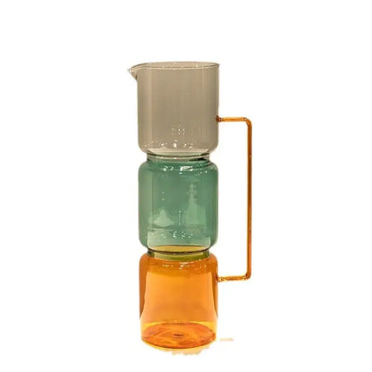A modern three-tiered stained glass pitcher with double glazing in amber teal and gray for living room decor