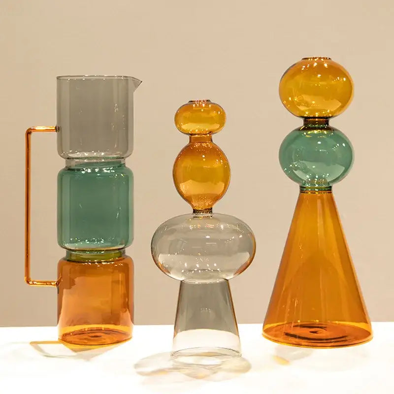 A modern amber and teal stained glass vase with double glazing and copper handle for living room decor