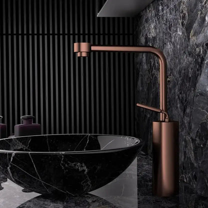Modern antique bronze faucet with copper finish, sleek curved design, and cylindrical brass base for bathroom use
