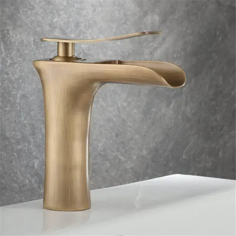 Modern antique bronze waterfall mixer faucet with brass finish and sleek curved spout for bathroom cold water use