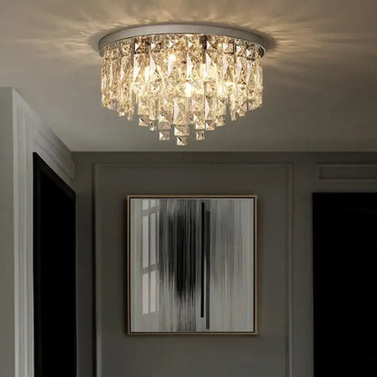 Modern art deco gold crystal steel led ceiling chandelier with silver frame and faceted prisms for dining room decorbites crystal steel