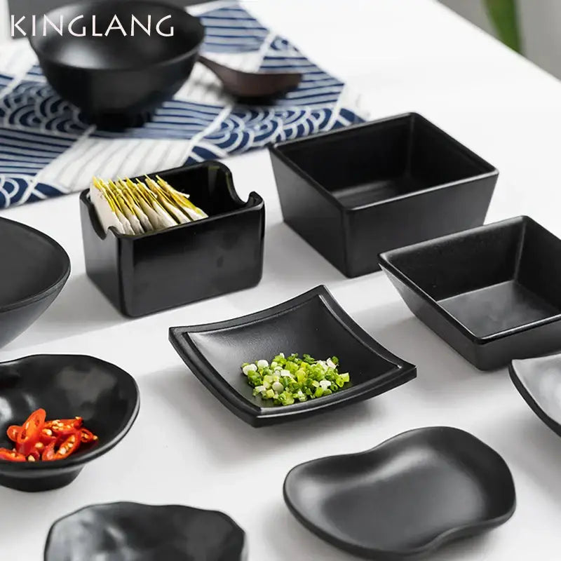 Set of sleek black melamine plastic dipping sauce bowls in various shapes by decorbites black melamine for modern dining