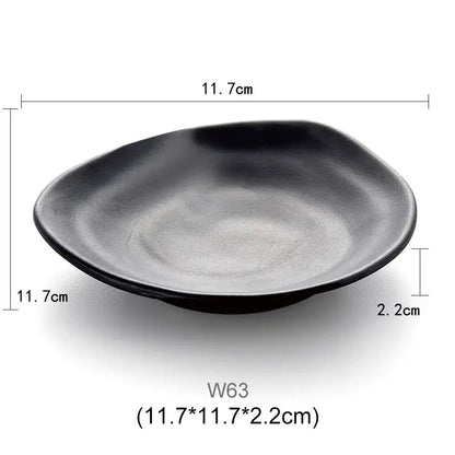 Modern asymmetrical black melamine plastic dipping sauce bowl with smooth glossy finish and organic edges decorbites black melamine