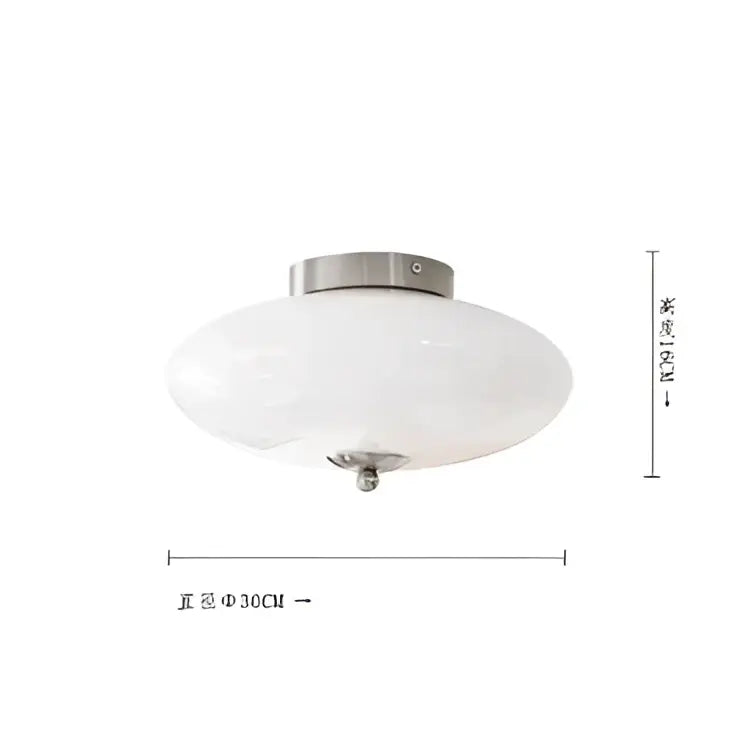 Modern bauhaus cream white ceiling lamp with a frosted cream white glass dome and brushed stainless steel base for bedroom