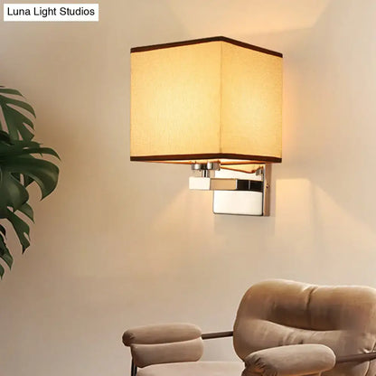 Modern beige fabric shade wall light with dark brown trim mounted on chrome e26 e27 sconce for bedroom use