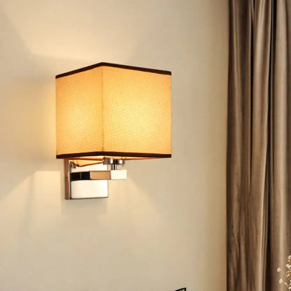 Square-shaped wall light with warm beige fabric shade and chrome metal base compatible with e26 e27 bulbs