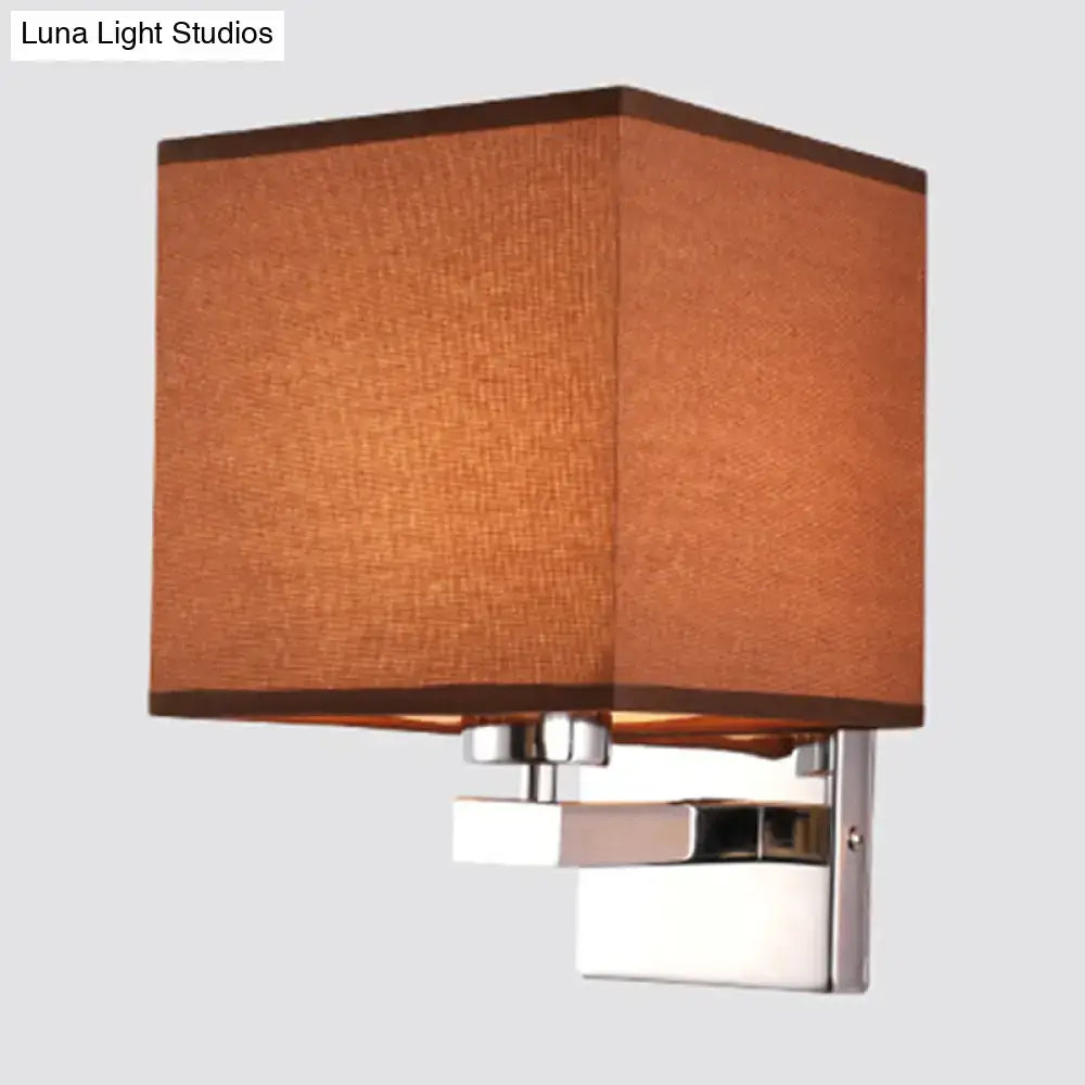 Modern wall light with warm brown fabric shade and polished chrome bracket compatible with e26 e27 bulbs for bedroom use