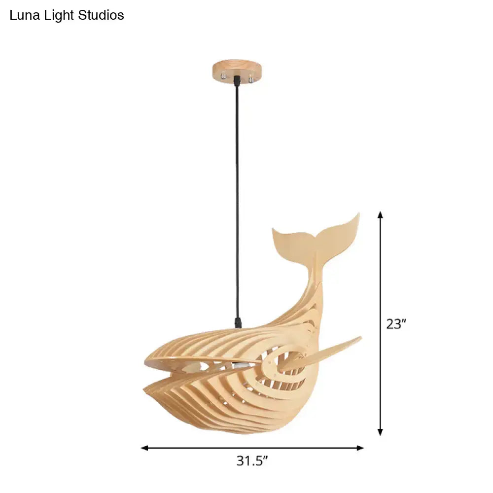 A modern hanging light beige wooden whale kids pendant lamp with a sleek layered design and black cord suspension