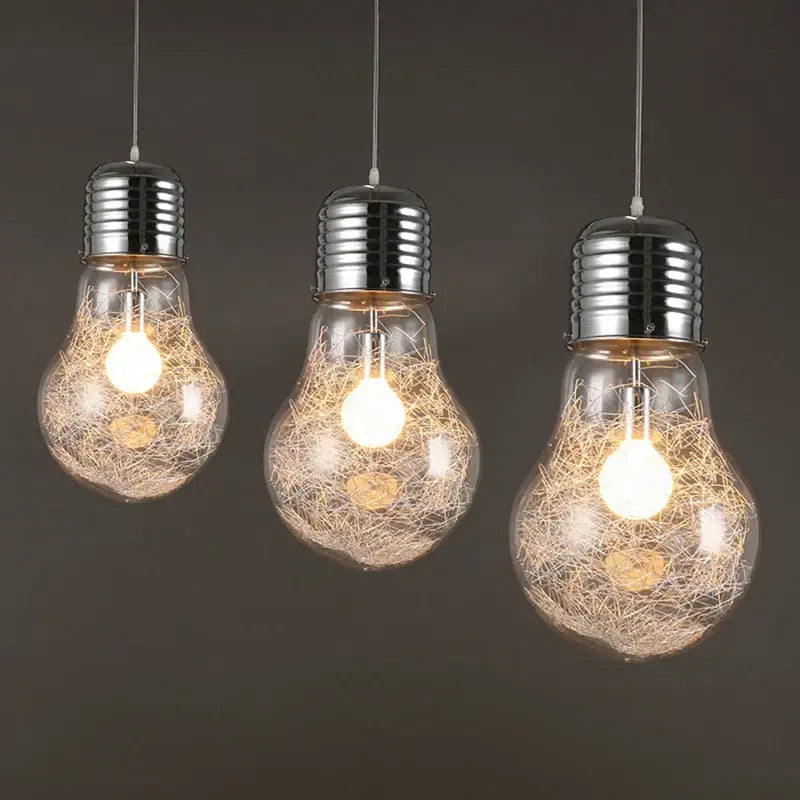 Three chrome pendant lights with clear glass decorbites big bulb led design for modern kitchen decor