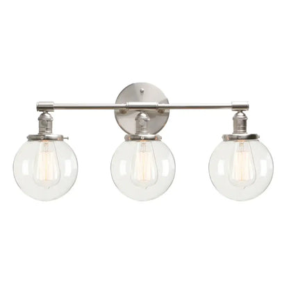 Modern black three-light wall sconce bathroom vanity fixture with clear glass globe shades and exposed filament bulbs