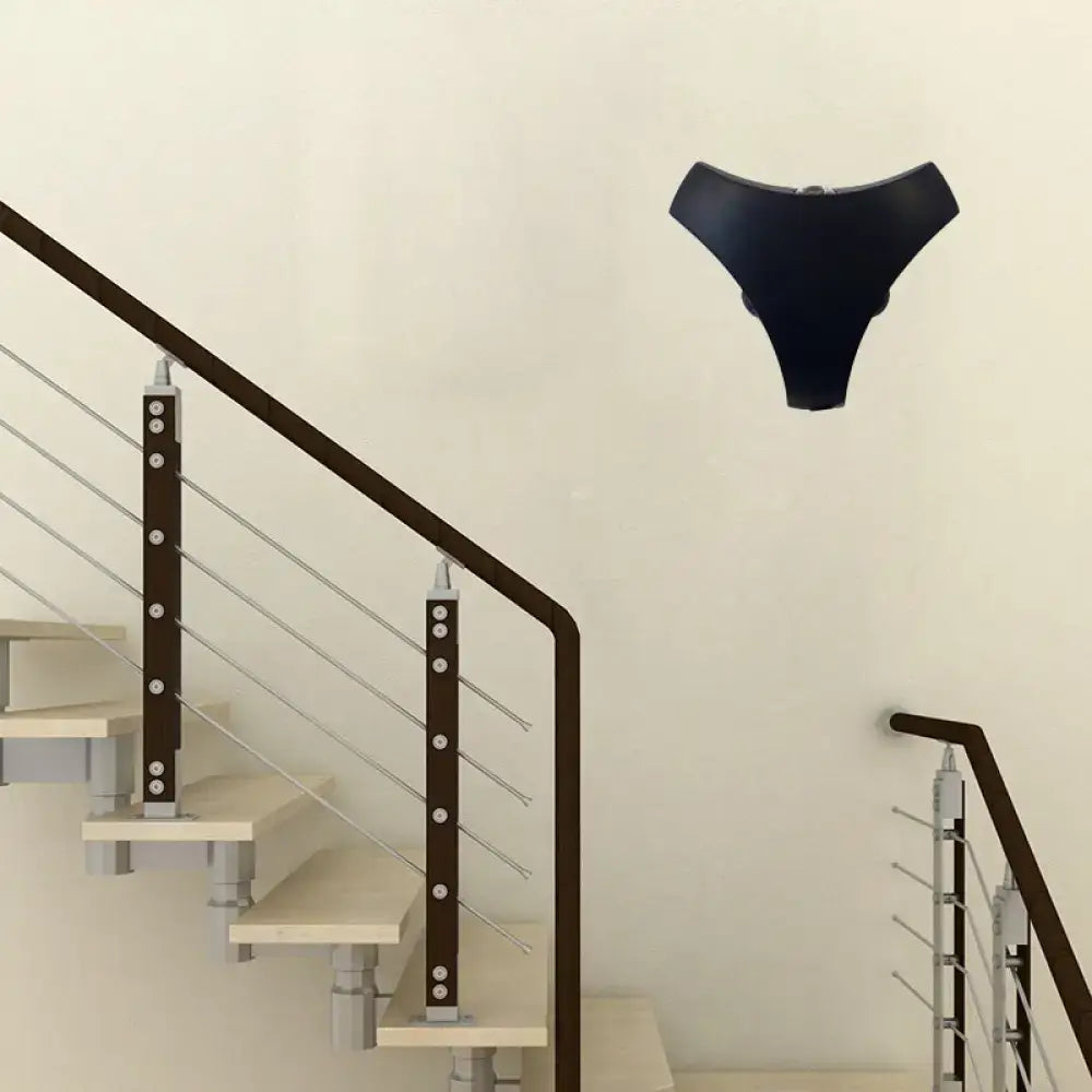 Modern black 3-light stairway sconce featuring a triangle aluminum shade and sleek sconce lighting design