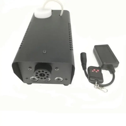 Modern black 500w rgb led smoke machine with perforated sides, white cap, and black remote control for party rooms