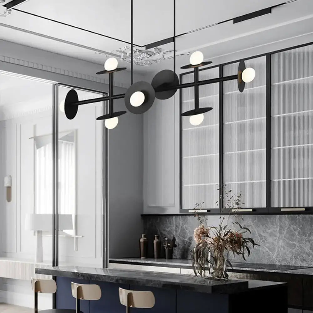 DecorBites modern black metal ceiling light fixture with circular discs and glowing white glass bulbs for kitchen use
