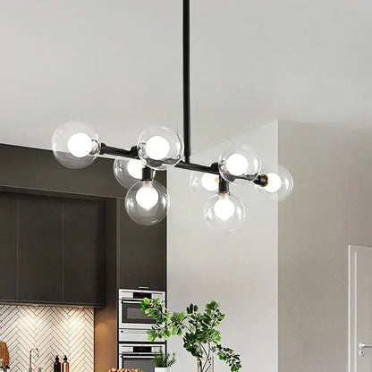 Modern black 8-head kitchen chandelier with clear glass shade and black metal light kit featuring globe bulbs