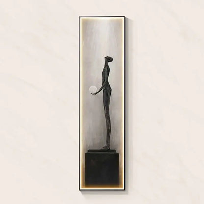Modern black abstract art led wall lamp featuring a dark bronze sculpture holding a sphere in an illuminated frame for decorbites decor