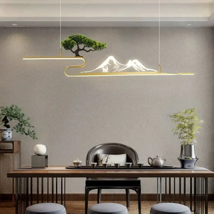 Gold-toned pendant lights with elegant acrylic mountain peak and bonsai tree design for modern living room decorbites decor