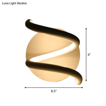Modern black acrylic spiral sconce light fixture with warm glowing led light strip for bedroom lighting