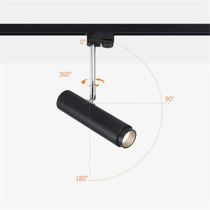 Modern black adjustable focus track lights with cylindrical design offering angle and rotation flexibility for commercial use