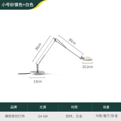 A sleek modern black decorbites adjustable led desk lamp with sandblasted silver aluminum alloy finish for study