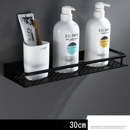 Modern black aluminum bathroom shelf with textured grid design and towel bar for shower storage by decorbites
