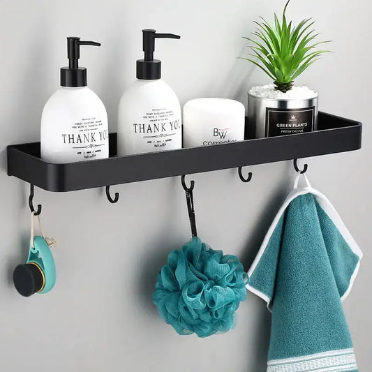Modern black aluminum bathroom shower shelf with hooks and towel bar holding toiletries and towel decorbites black aluminum