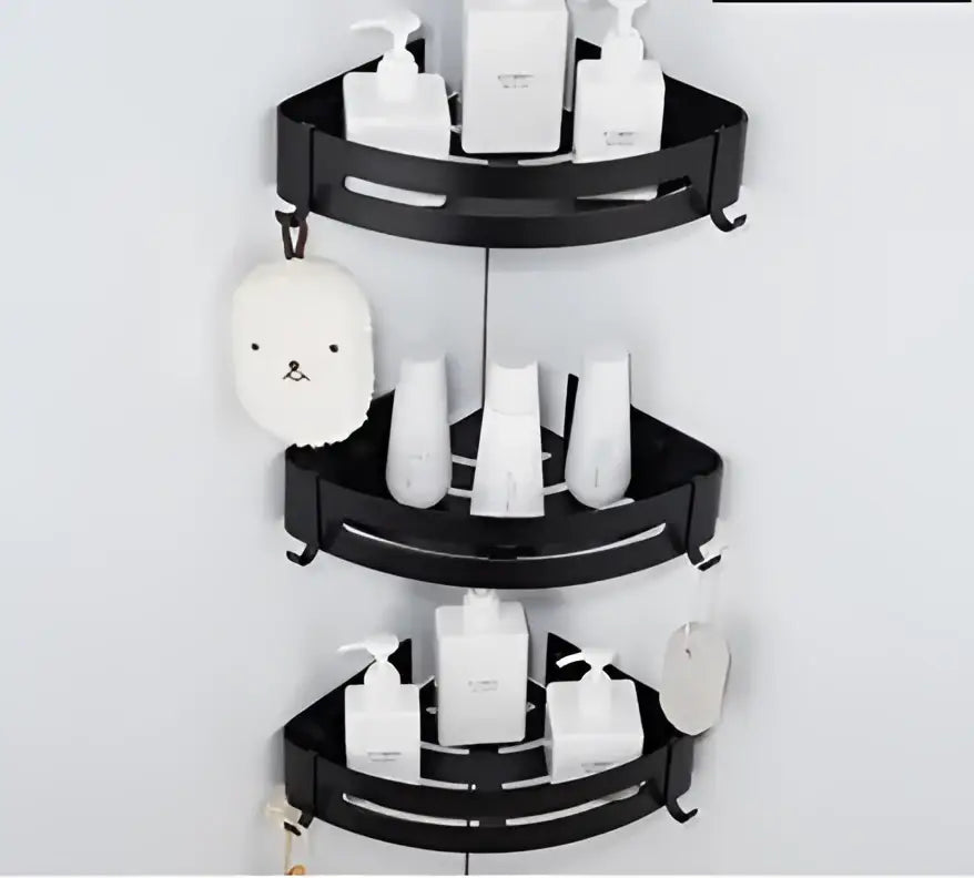 Black three-tiered corner shelf with sleek curved shelves and hooks made of decorbites black aluminum wall mount