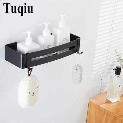 Modern black aluminum corner shelf bathroom storage caddy with hooks holding soap dispensers and bath sponges