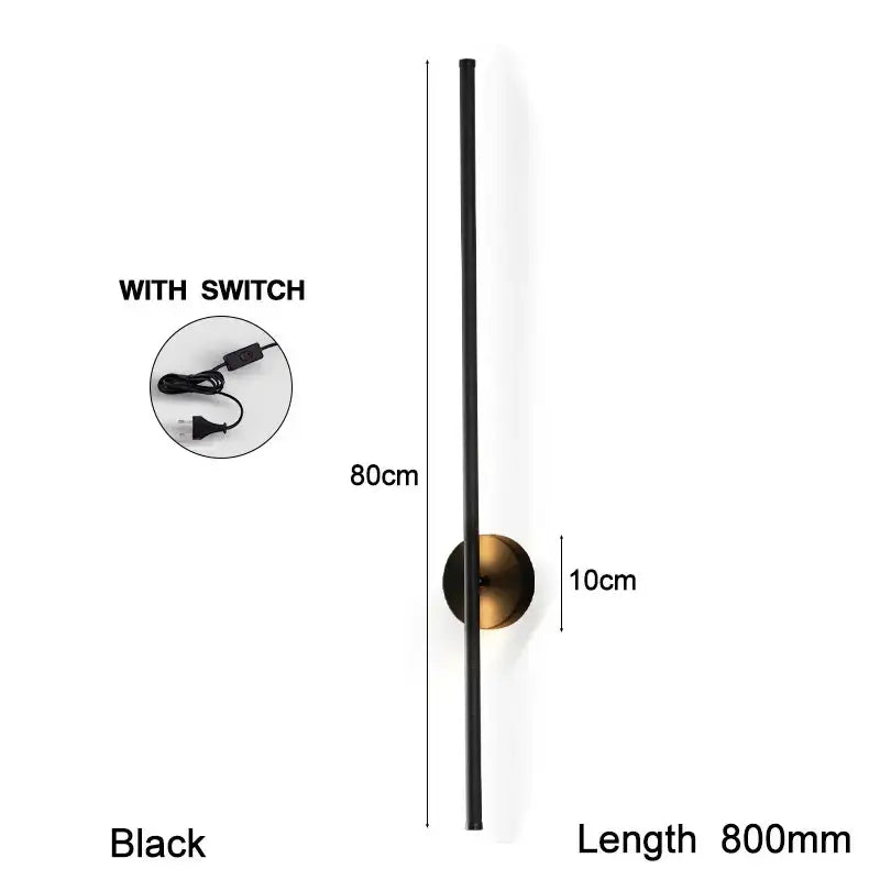 Modern black and brass rotation led wall light featuring a minimalist vertical rod and circular base for living room use