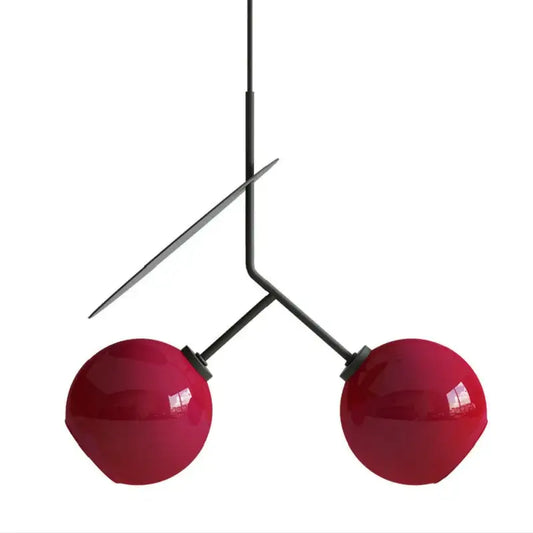 Modern black metal pendant light with two glossy crimson glass cherry pendant shades for dining room decorbites decor