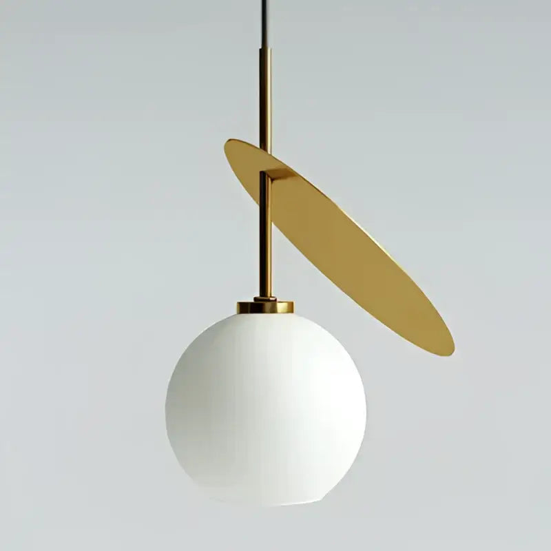 Modern black and crimson glass cherry pendant light with white spherical pendant light and gold metallic stem decorbites glass cherry