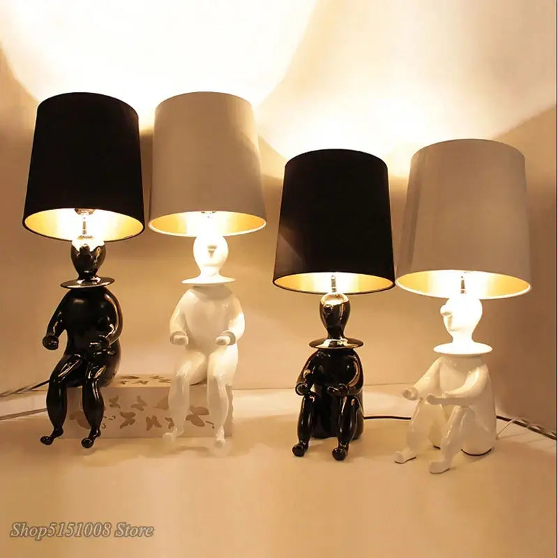 Modern black and gold ceramic clown desk lamp with sleek minimalist black and white ceramic figurine decorbites clown desk