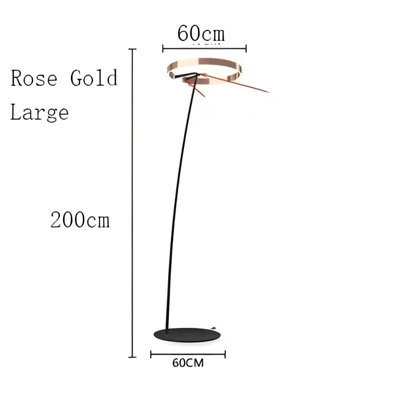 Rose gold large floor lamp with sleek curved stem and circular base in decorbites circular luminescence led style