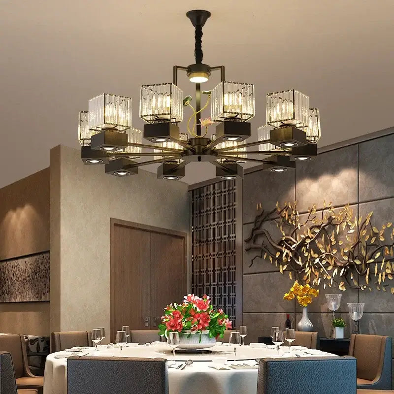 Modern black and gold crystal dining room chandelier with brass intricate metalwork and vine design for decorbites crystal dining
